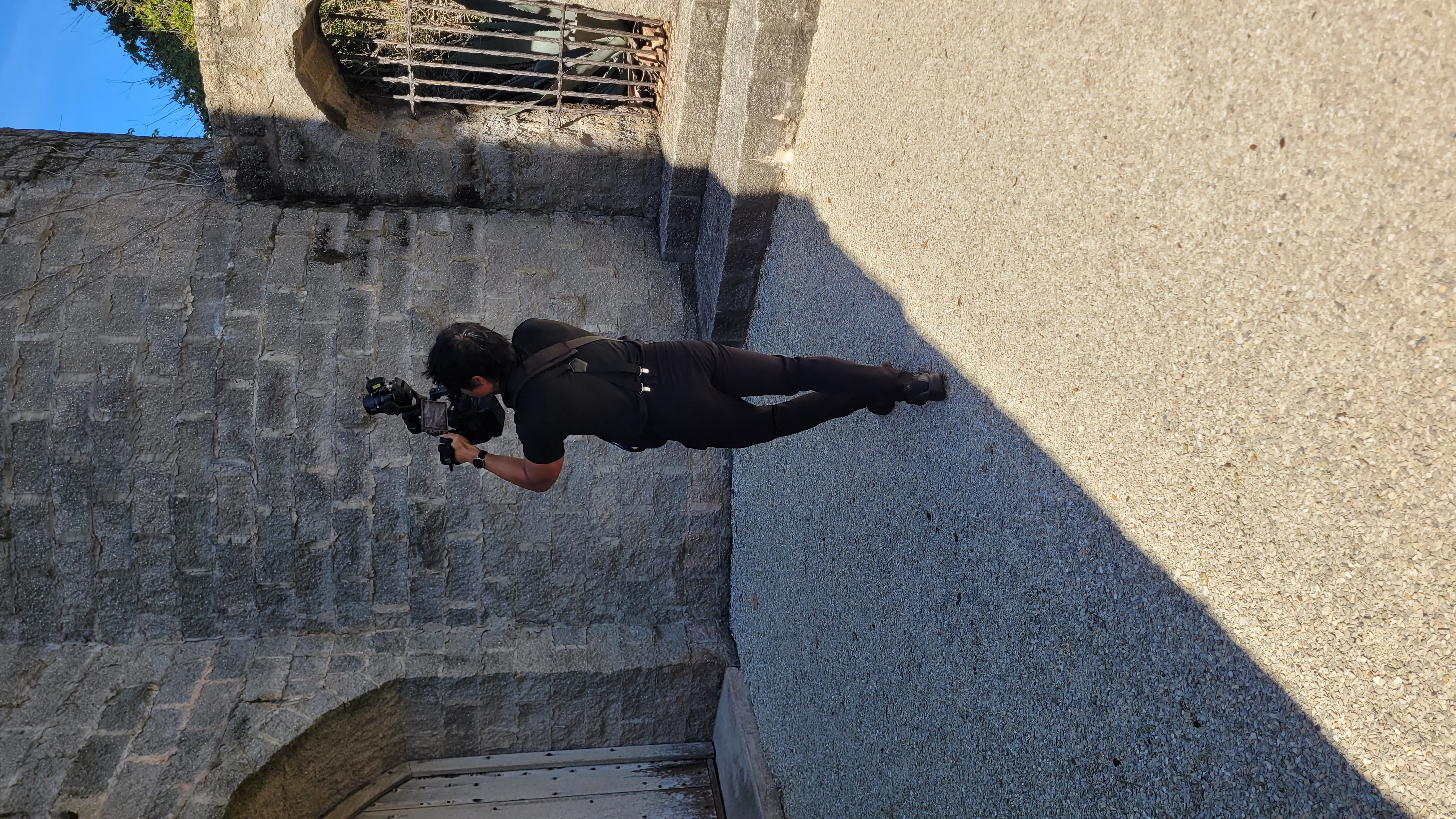 St. Augustine wedding videographer framing an exterior shot of Castle Otttis